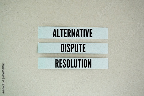 Photography Paper arranged with the words Alternative Dispute Resolution