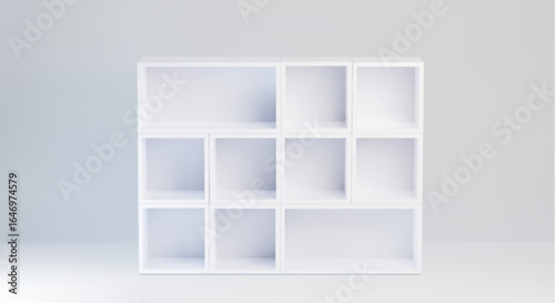 White cabinet with with mixed size empty compartments - modern shelf unit with clean box sections in grid formation for storage, display or organization. Minimalist furniture piece for home, office