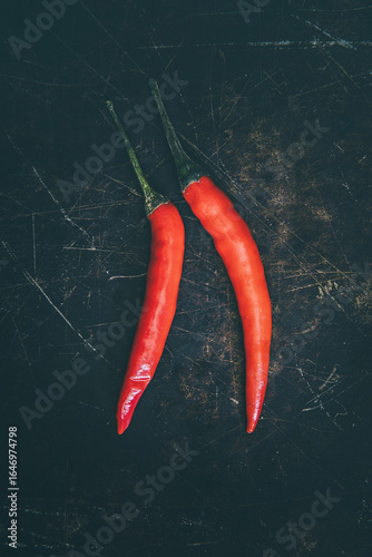 Tabasco chilies on a metal tray background