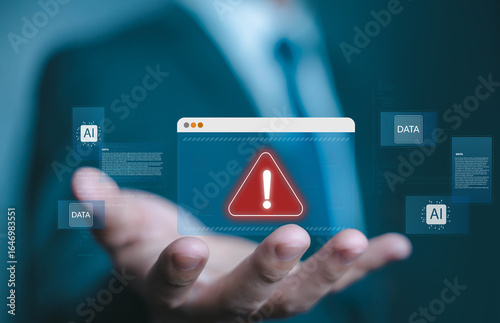 Photos Cybersecurity alert warning in businessman’s hand, protecting AI data, preventing digital threats in artificial intelligence systems, symbolizing technology safety, risk management