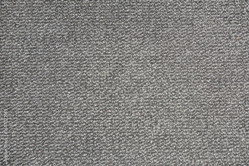 Obraz na plátně Textured background of gray carpet speckled with short-pile strands