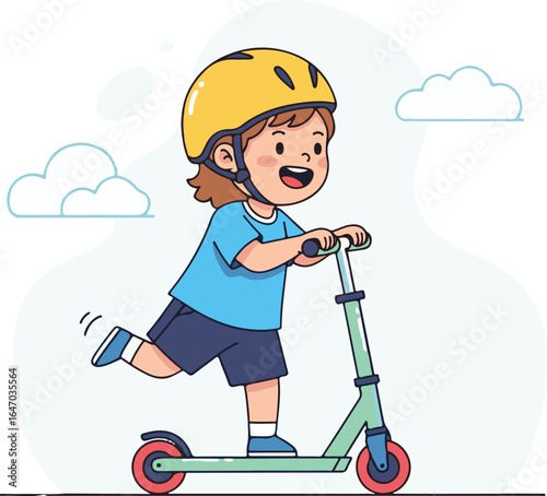 A cheerful young child with a yellow helmet rides a green scooter with one leg up in a playful manner against a cloudy sky.