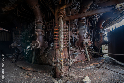 Abandoned Heavy Industrial Ruins with Large Blast Furnace in Steelworks