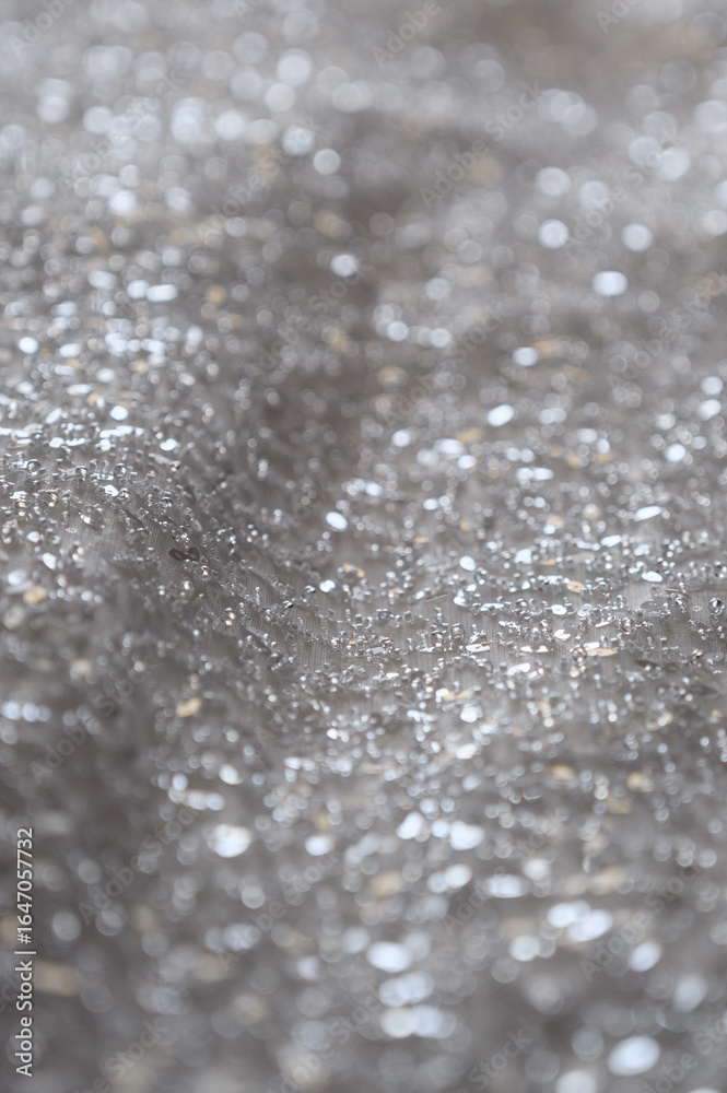 Obraz premium abstract background of silver sequins.