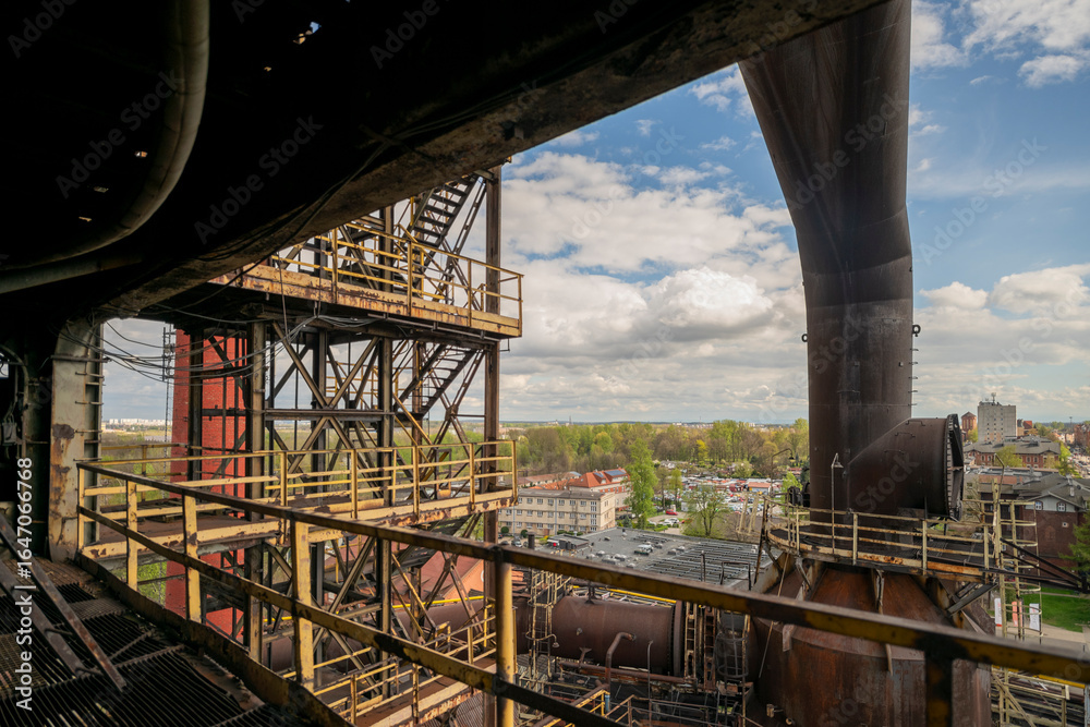 Fototapeta premium Abandoned Heavy Industrial Ruins with Large Blast Furnace in Steelworks