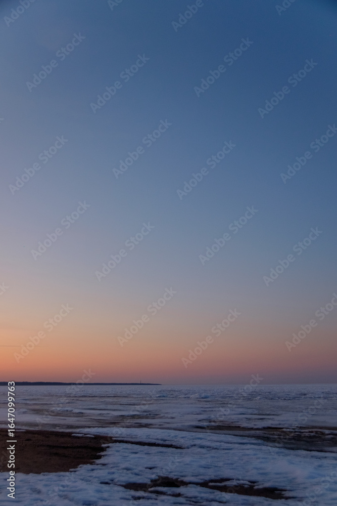 Fototapeta premium sunset on a lake with unusual colors