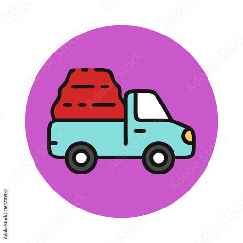 A truck is carrying a haystack