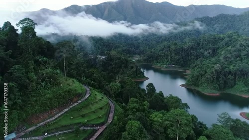 Misty Mountain Valley with Lush Forest and Lake