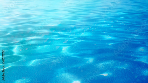 透明な青い海とグラデーション水面の波紋テクスチャ写真	