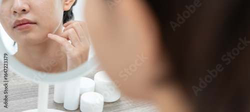 Fotografie Young woman asian are worried about faces Dermatology and allergic to steroids in cosmetics