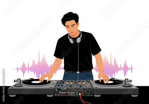 Young DJ Mixing Music on Turntables with Headphones