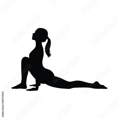 Silhouette of a woman in a low lunge yoga pose