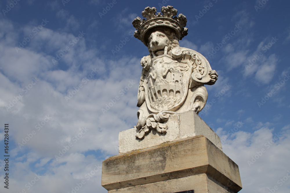 Fototapeta premium sculpted lion and blazon on the charles III bridge in miranda de ebro in spain