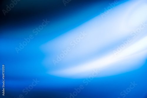 Canvas Print Abstract blue and white blurred light background