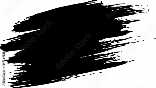Black ink brush stroke texture on white background with rough edges and uneven distribution of pigment