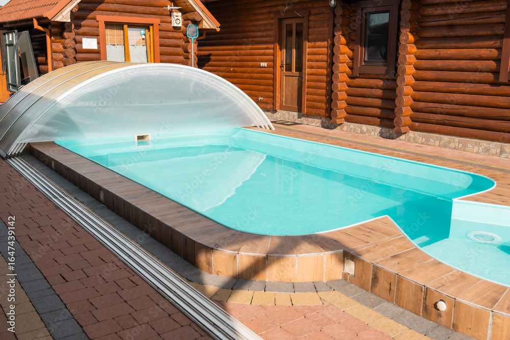 Fototapeta premium Swimming pool at a house closeup background.