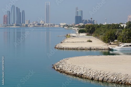 The city skyline by the water from the Hudayriyat Bridge in Abu Dhabi