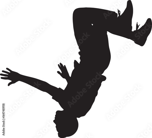 silhouette man performing backflip stunt in midair pose