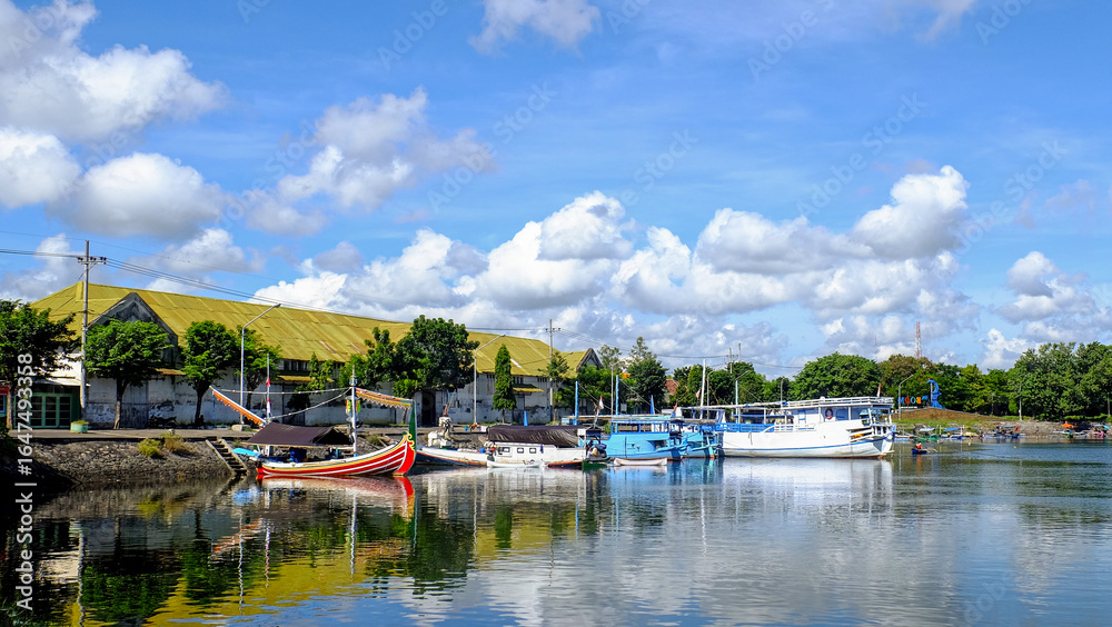 Fototapeta premium Lake and Boat in Banyuwangi with mountain view