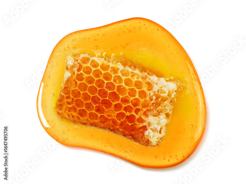 Papier peint Golden honeycomb pieces dripping with honey