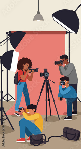 Group of diverse photographers taking pictures in a studio with lighting equipment and a red backdrop.