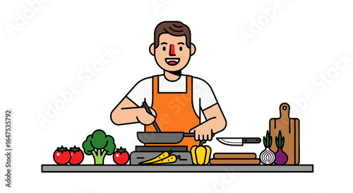 A smiling man in an apron cooks food in a pan, surrounded by fresh vegetables on a countertop.