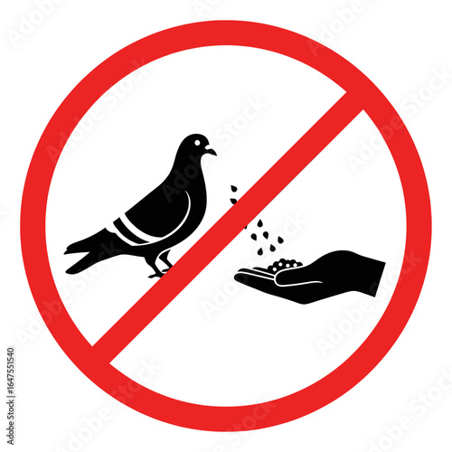 No feeding birds sign Black silhouette of pigeon and hand with seeds Red prohibition circle high quality professional