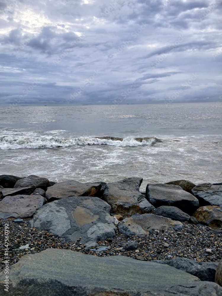 Fototapeta premium Beach, rocks, and wave