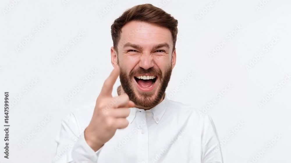 Smiling man with beard points forward, conveying confidence and approachability, set against a minimalistic white background, ideal for motivational themes