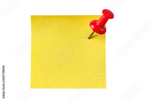 A yellow post it note with a red pin on it. The pin is sticking out of the paper