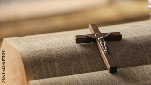 Wooden Jesus Cross on Old Book