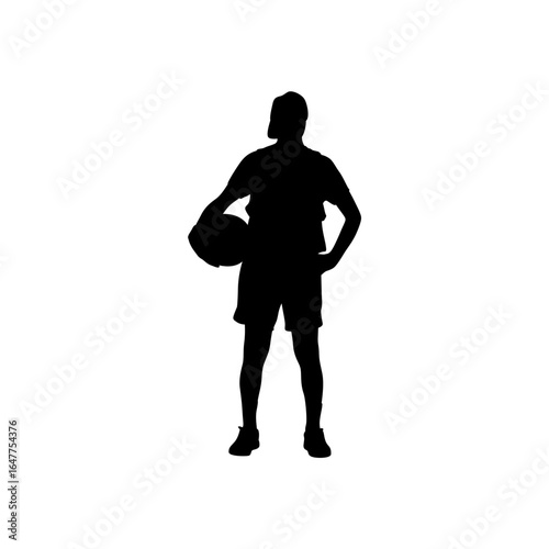 This black silhouette of a basketball player holding a ball conveys a moment of focus and anticipation.