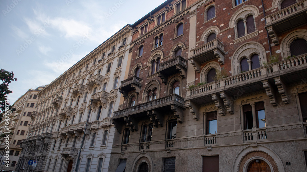 Obraz premium Italian Building Facade with Balconies and Shutters