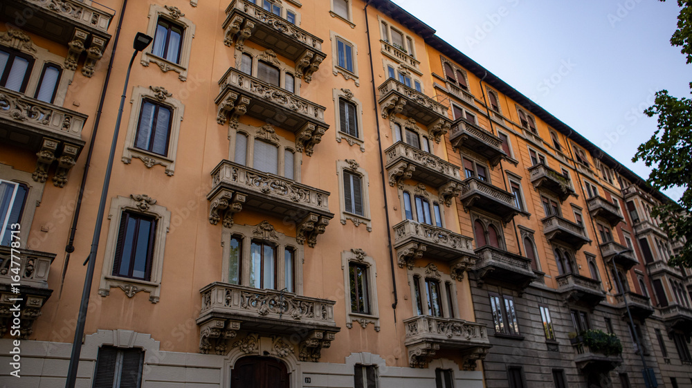 Fototapeta premium Italian Building Facade with Balconies and Shutters