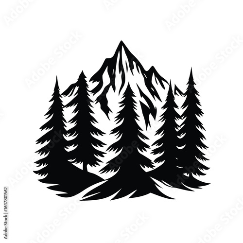 Majestic mountain peak rising behind a forest of pine trees silhouette