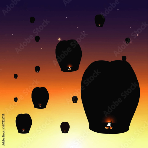 Silhouette of numerous illuminated paper lanterns floating in the twilight sky during dusk.