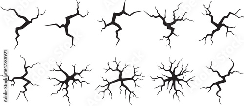 Collection of ten black crack graphic elements on a white background cracks fissure