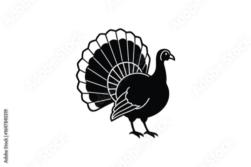 A black silhouette of a turkey with its feathers spread out