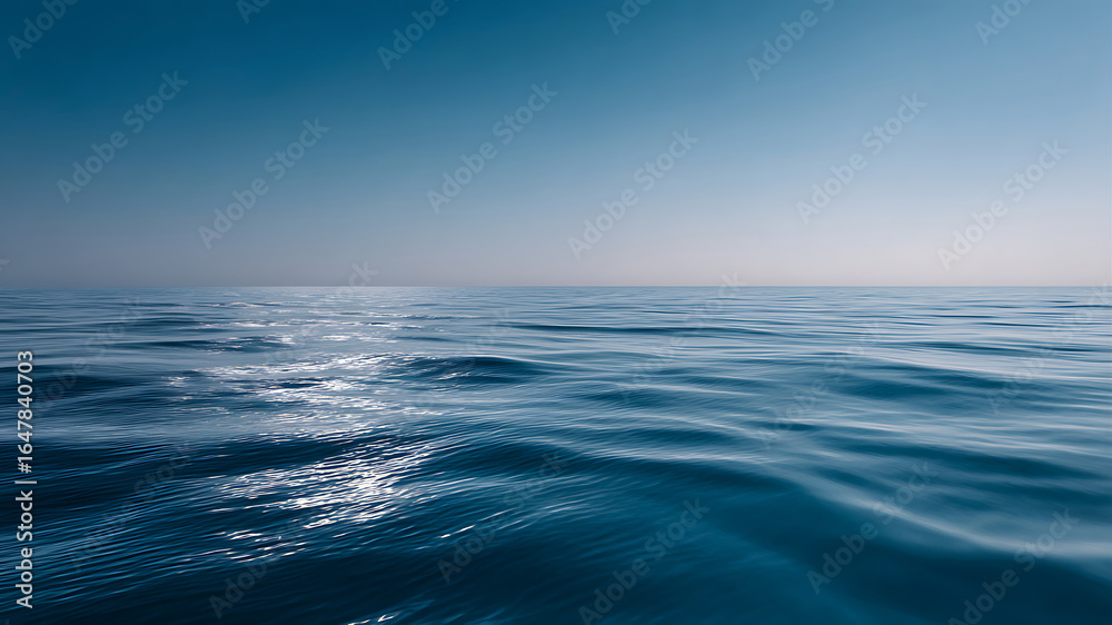 Obraz premium Serene Ocean View: Calm Blue Waters and Clear Sky Horizon