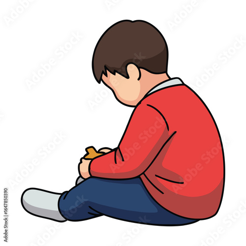 A little boy in a red shirt sits on the floor, his head bowed, looking at something in his hands.
