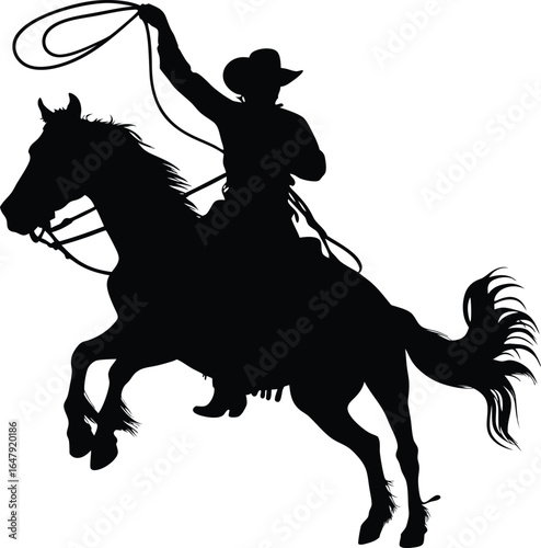 Silhouette of a Cowboy Riding a Bucking Horse with a Lasso, a Majestic Western Scene of Skill and Precision
