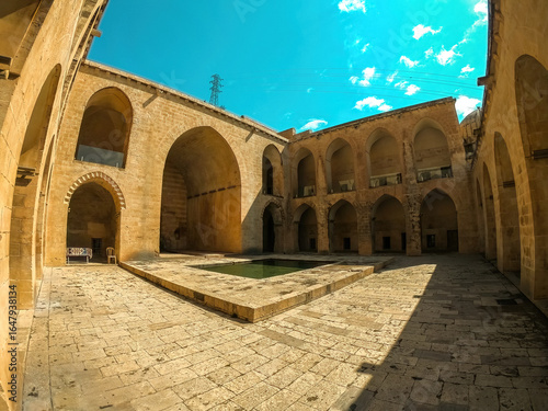 Kasimiyye Madrasa in Mardin, Turkey, featuring historic architecture, ancient stonework, and cultural heritage.