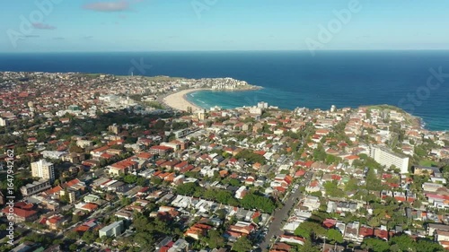 Aerial view of bondi beach and the city of sydney on a sunny day