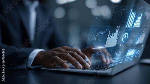 automated reporting and business intelligence data automation and dashboards businessman using laptop computer to generate and monitor real time reports