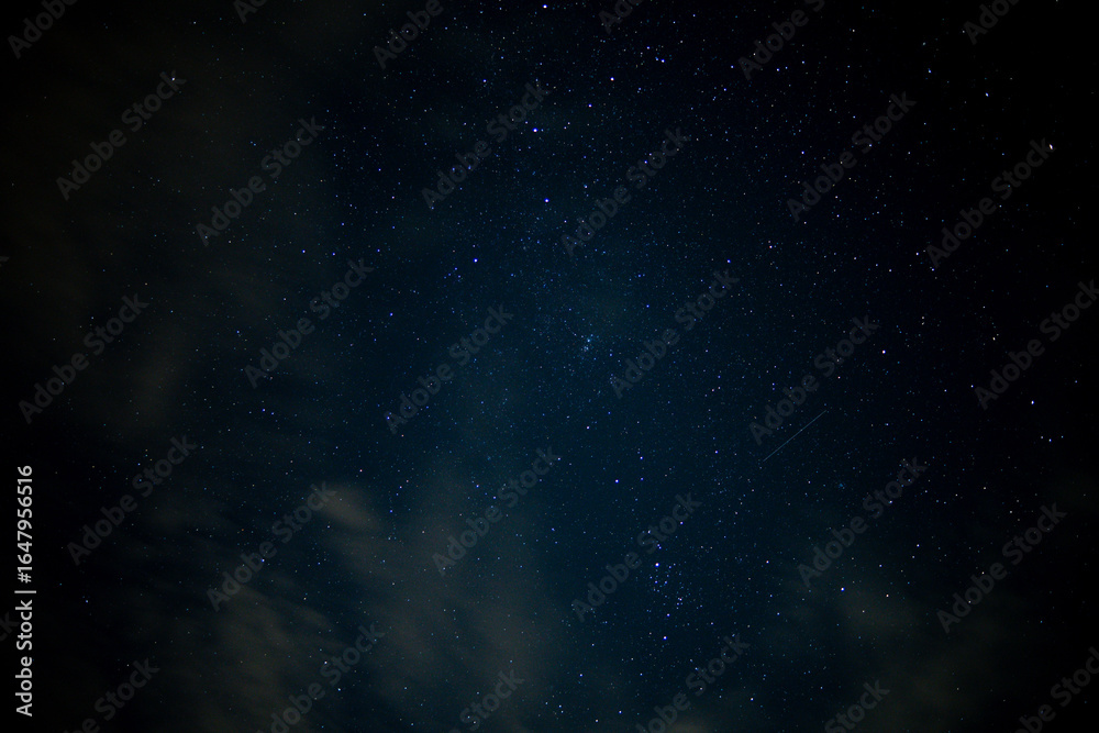 Fototapeta premium space background with stars and light clouds