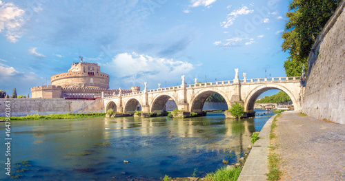 Walking alomg the shores of the Tiber river, Rome, Lazio, Italy