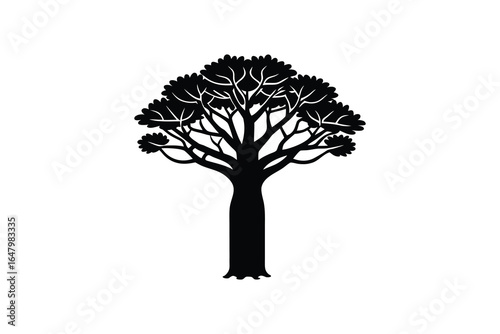 A black silhouette of a tree with a thick trunk and leafy branches