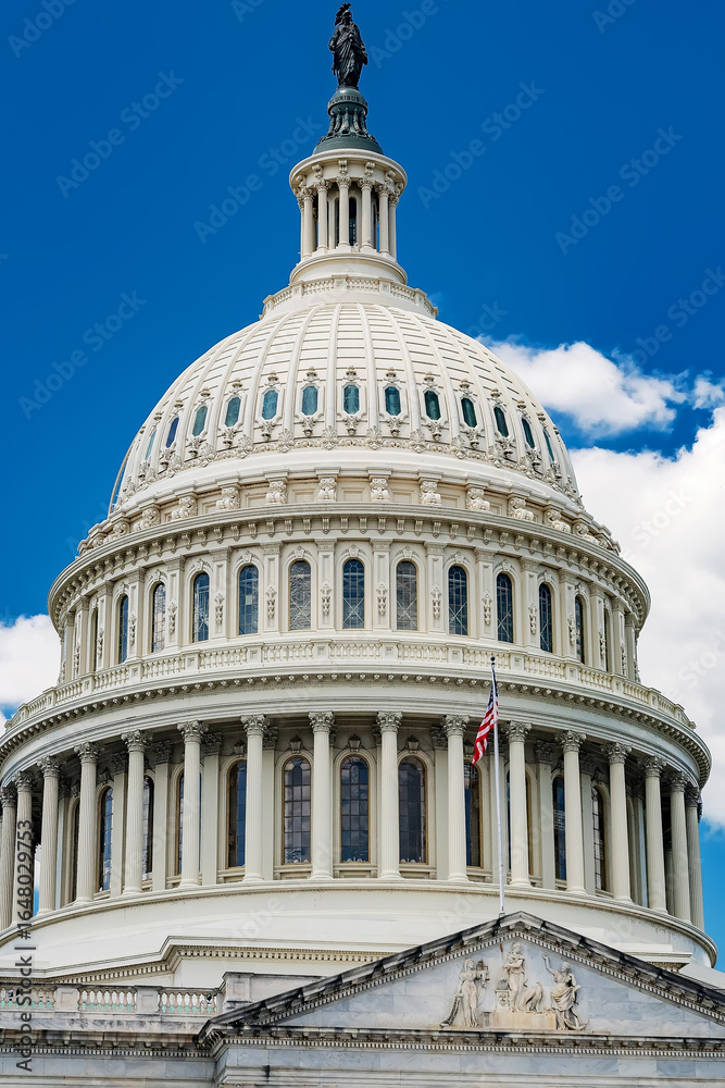 Fototapeta premium View of Washington DC Government Landmark. Dome of US Congress under blue sky