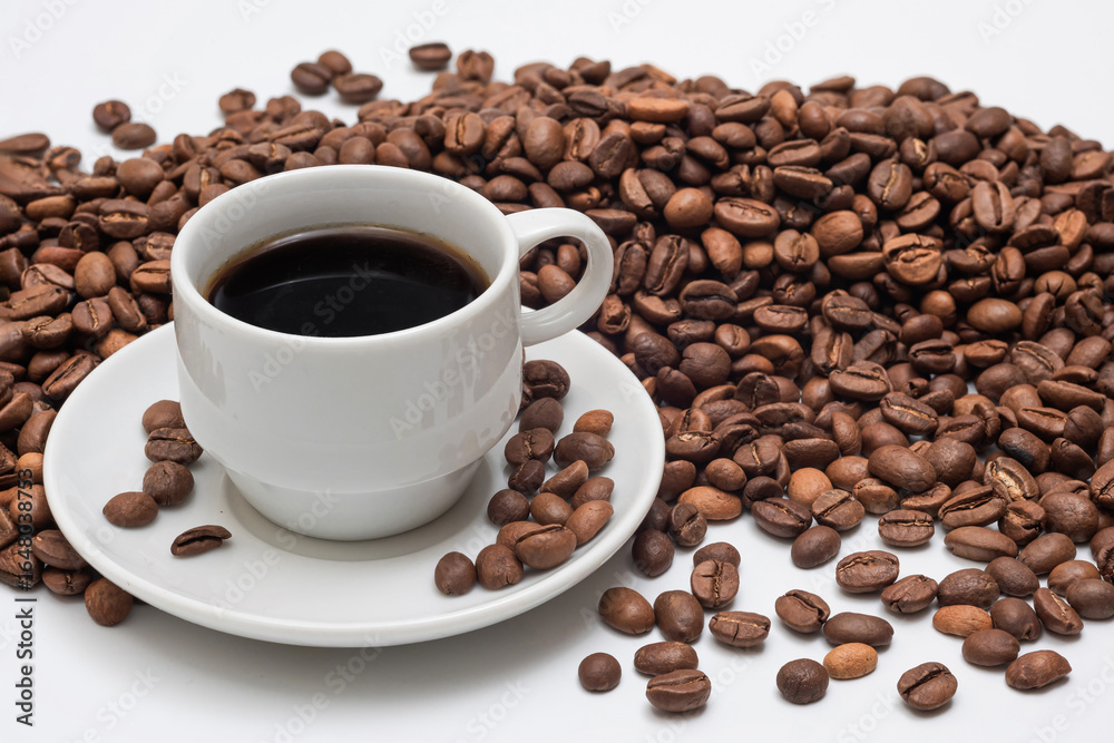 Fototapeta premium Cup of aromatic coffee and coffee beans on a white background