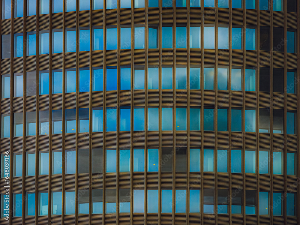 Obraz premium Abstract architectural texture of modern glass and metal building facade